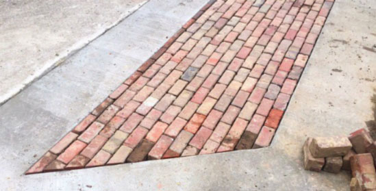 photo of finished parking lot with bricks